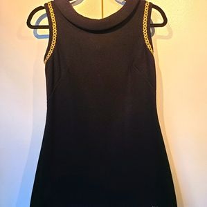 One of a kind. Tunic top with gold detailing.